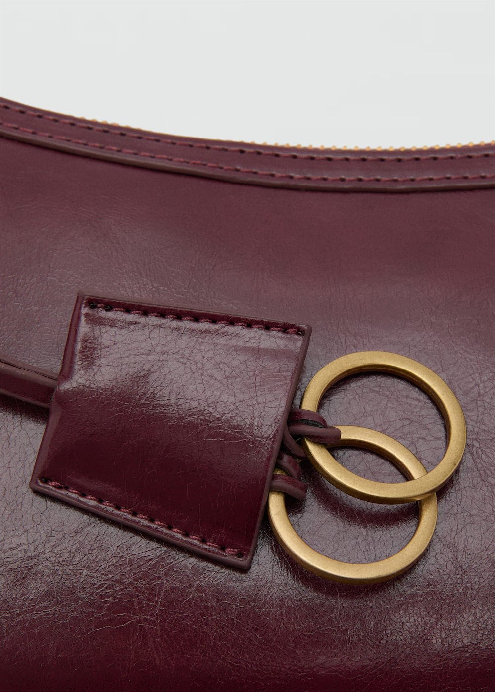 Crossbody bag with charms and rings - Image 6